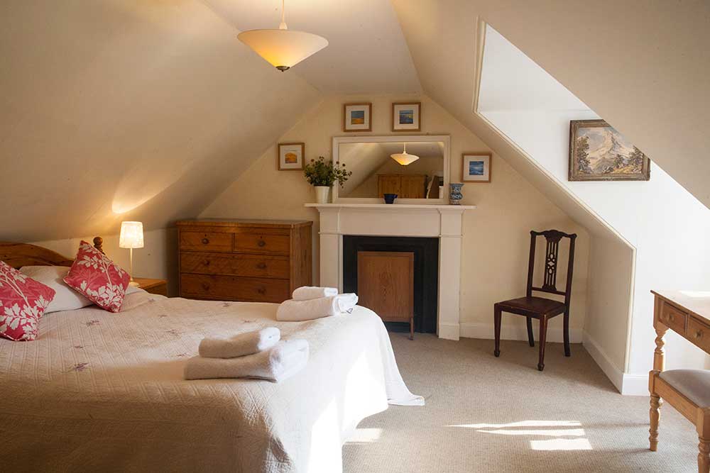 A unique lochside cottage hideaway. This popular holiday home, full of character, includes use of a boat moored nearby.